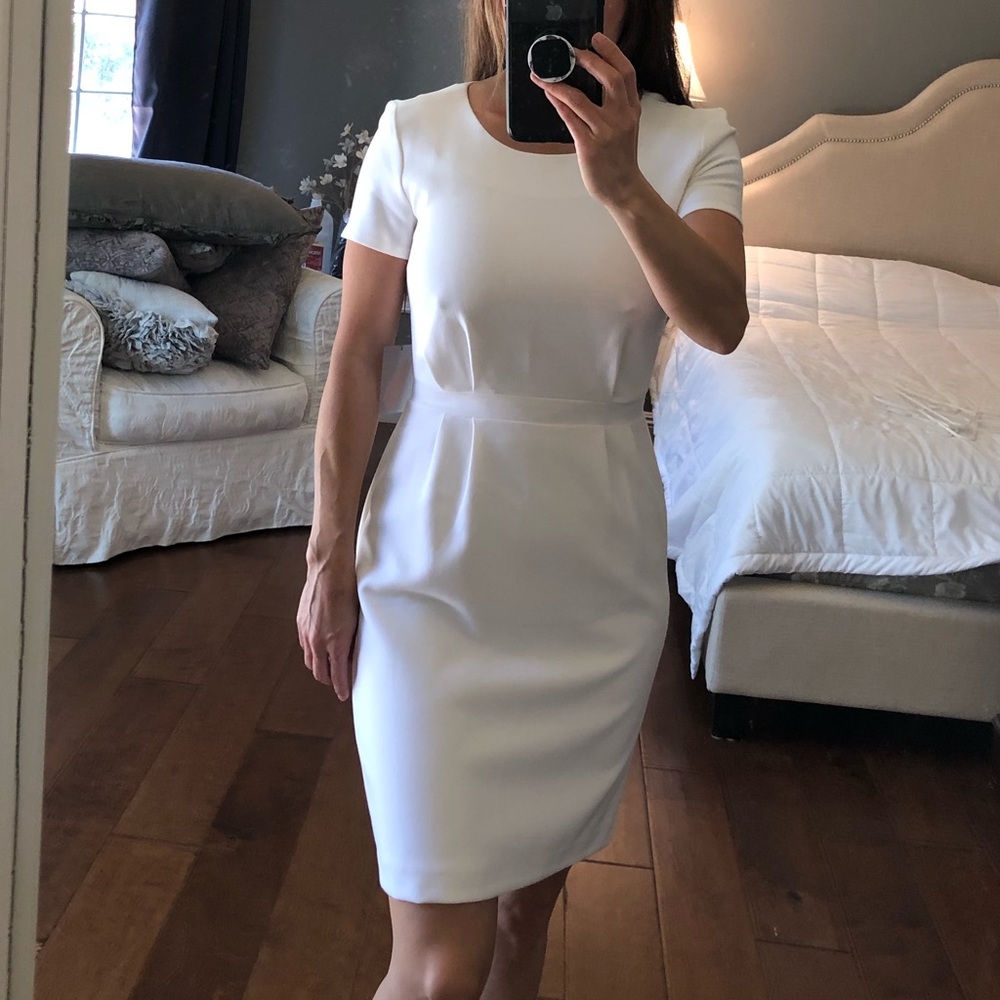 New with tags. White feminine dress